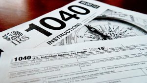 PHOTO: Internal Revenue Service taxes forms are seen on Feb. 13, 2019. (AP Photo/Keith Srakocic)
