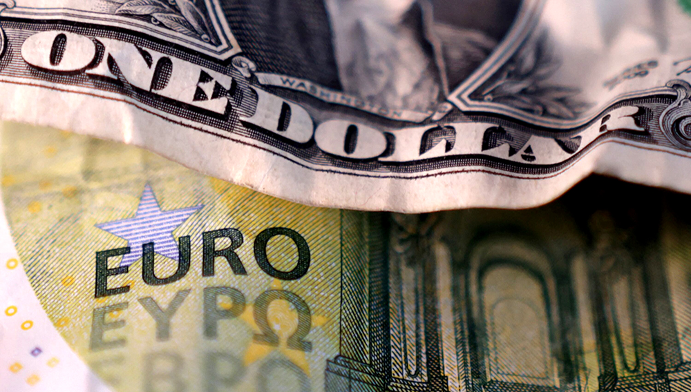 U.S. dollar and Euro banknotes are seen in this illustration taken March 19, 2025. REUTERS/Dado Ruvic/Illustration