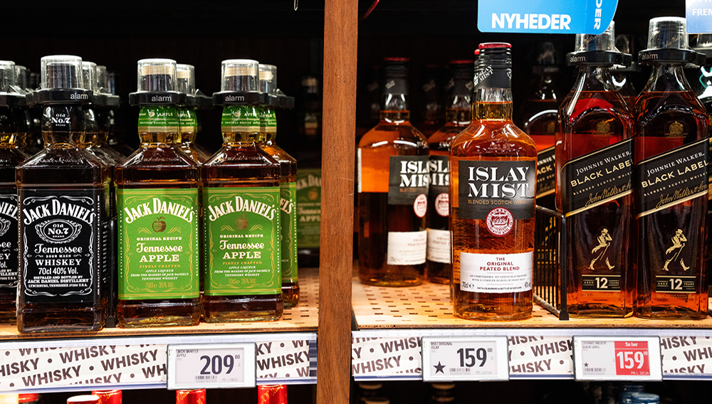 Bottles of spirits are labeled with a star in Bilka in Randers, Denmark, making it easier for customers to buy European goods, Monday, March 17, 2025. (Bo Amstrup/Ritzau Scanpix via AP)