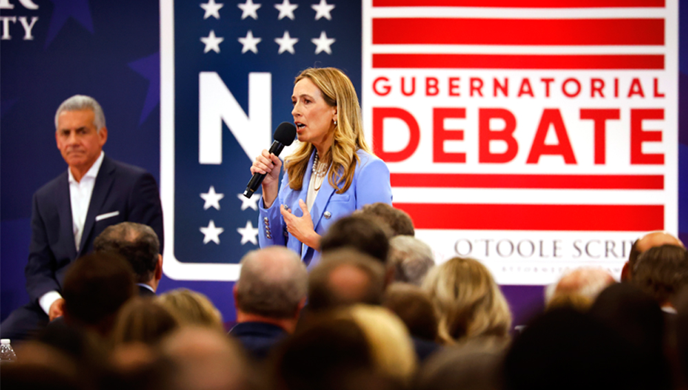 Democrat Mikie Sherrill responds to questions during the first general election gubernatorial debate with Republican opponent Jack Ciattarelli, Sunday, Sept. 21, 2025, in Lawrenceville, N.J. (AP Photo/Noah K. Murray)