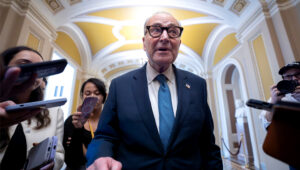 Senate Minority Leader Chuck Schumer, D-N.Y., talks to reporters as he departs for a meeting with President Donald Trump and the top four congressional leaders to discuss the government funding crisis, at the Capitol in Washington, Monday, Sept. 29, 2025. | J. Scott Applewhite/AP