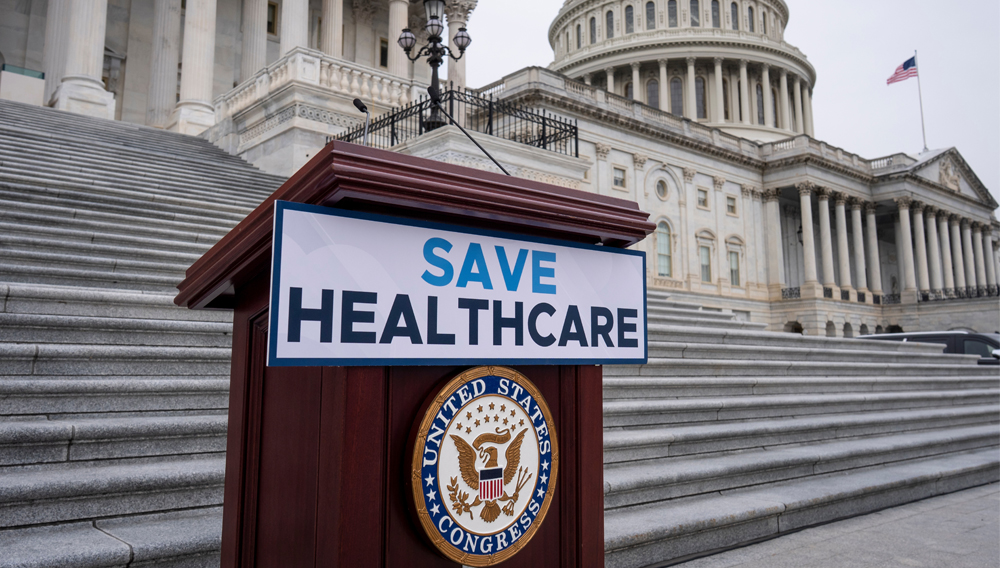 House Democrats prepare to speak on the steps of the Capitol to insist that Republicans include an extension of expiring health care benefits as part of a government funding compromise, in Washington, Sept. 30, 2025. (AP Photo/J. Scott Applewhite)