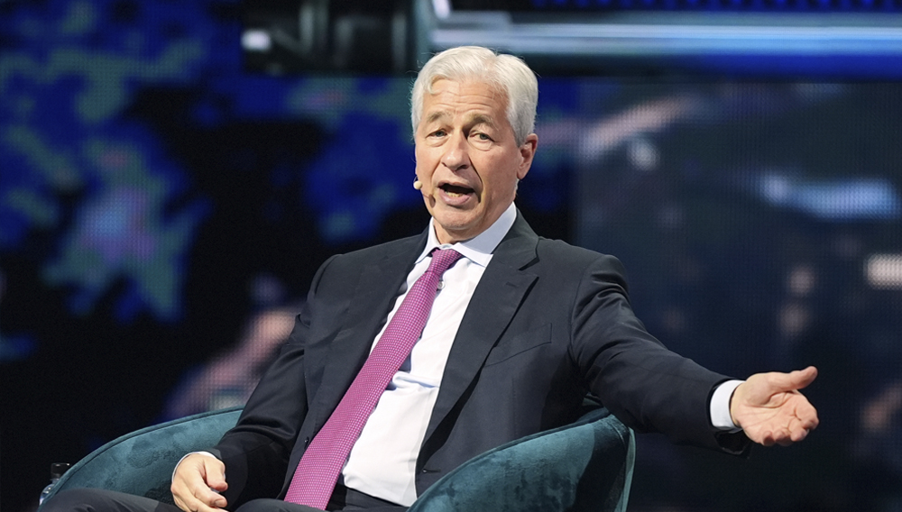 Jamie Dimon, CEO of JPMorgan Chase, speaks at the America Business Forum, Thursday, Nov. 6, 2025, in Miami. (AP Photo/Rebecca Blackwell)