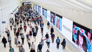 Commuters walk through a corridor in the World Trade Center Transportation Hub in New York on June 21, 2019. (AP Photo/Mark Lennihan, File)