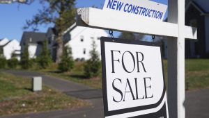 A sign is posted for a new home for sale in Ambler, Pa., Oct. 16, 2025. (AP Photo/Matt Rourke)