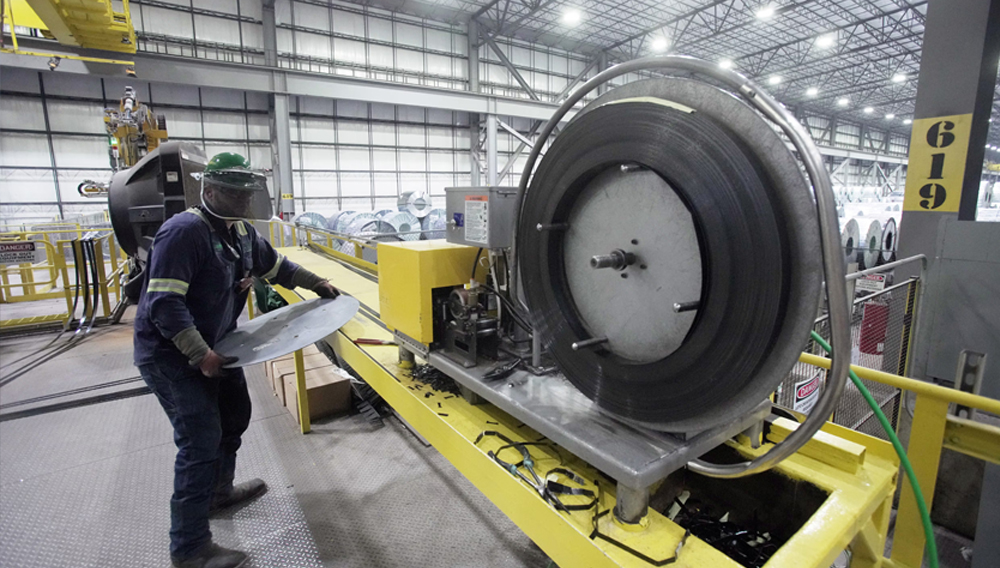 An employee works inside a Nucor steel factory in Blytheville, Arkansas, U.S., March 28, 2025. REUTERS/Karen Pulfer Focht