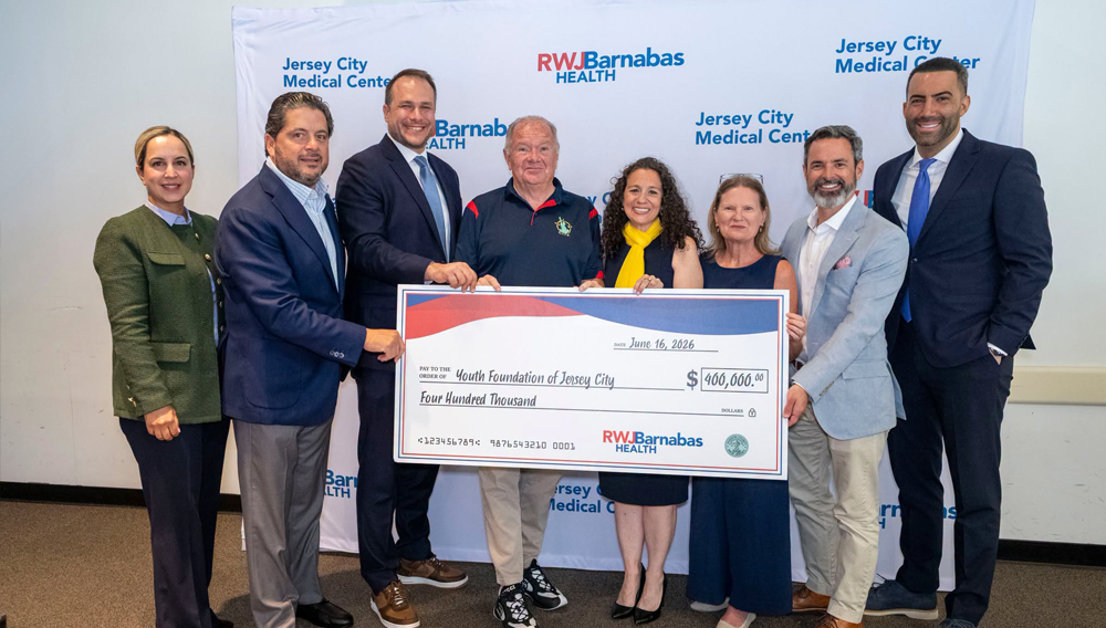 Mark E. Manigan, President and Chief Executive Officer, RWJBarnabas Health; Balpreet Grewal-Virk, PhD, Senior Vice President, Community Health, RWJBarnabas Health; Jonathan P. Kyriacou, President and Chief Executive Officer, Jersey City Medical Center; and Hudson County Executive Craig Guy joined by Jersey City Mayor James Solomon and representatives from Youth Foundation of Jersey City, including Hollie Meyer, Executive Director; Veronica Park, Co-Chair; and Brian DiFeo, Board Member.