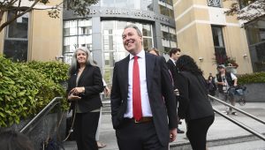 Jason Slothouber, Senior Prosecutor for the Colorado Attorney General's Office, walks outside court after tech giant Meta agreed to pay $17 billion as part of a settlement to end a landmark trial over teen social media addiction on Wednesday, Aug. 26, 2026, in Oakland, Calif. (AP Photo/Noah Berger)