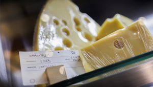 An Emmentaler cheese imported from Switzerland is displayed in a store as a dispute over protected cheese names has emerged as a flashpoint in trade talks involving Mexico, the United States and the European Union, in Mexico City, Mexico August 26, 2026. REUTERS/Raquel Cunha.