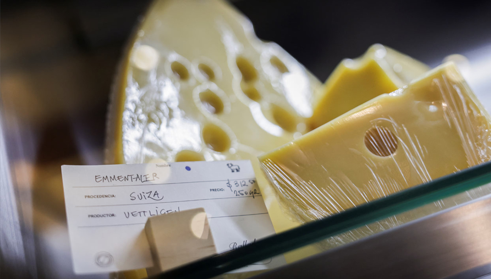 An Emmentaler cheese imported from Switzerland is displayed in a store as a dispute over protected cheese names has emerged as a flashpoint in trade talks involving Mexico, the United States and the European Union, in Mexico City, Mexico August 26, 2026. REUTERS/Raquel Cunha.