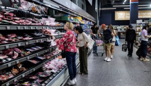 Photo: People shop for groceries in New York City, U.S., August 26, 2026. REUTERS/Jeenah Moon/File Photo